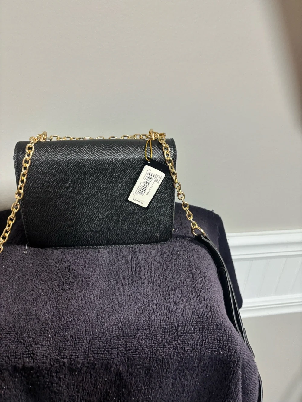 bebe Black Crossbody Clutch with Gold Script Logo